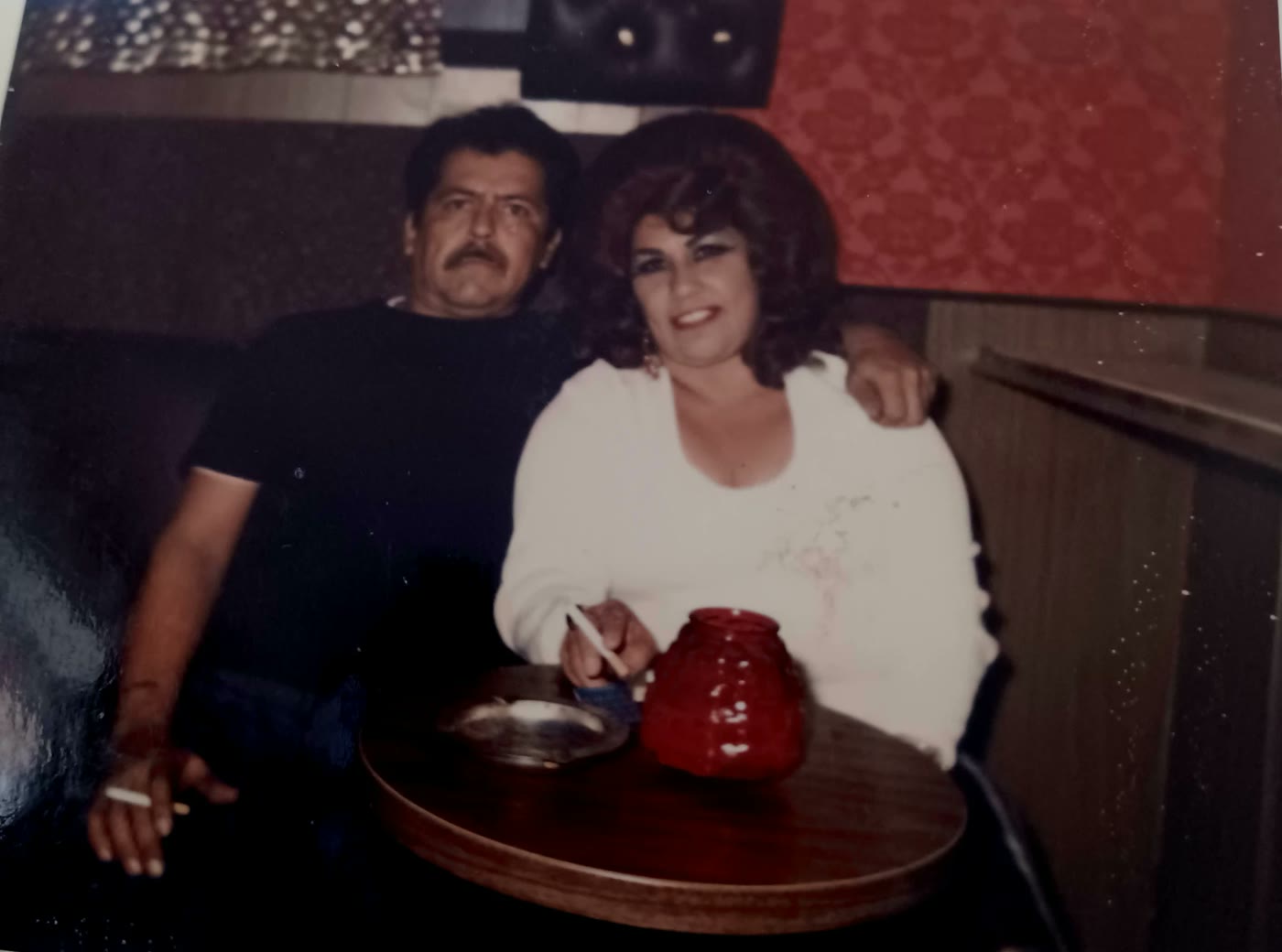 Lovie and Dad sitting together at a table