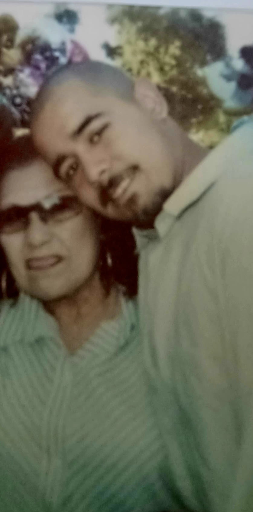 SIN cheek to cheek with his grandma Lovie
